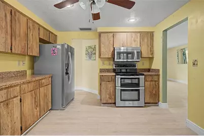1100 Persimmon Drive, Palm Harbor, FL 34683 - Photo 13