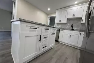 7039 E Lenox Dr E, New Port Richey, FL 34653 - Photo 5
