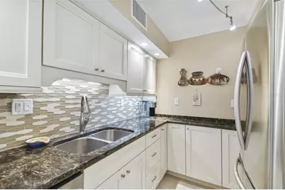 10355 Paradise Boulevard #702, Treasure Island, FL 33706 - Photo 25