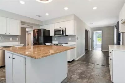 303 Barstow Court, Sun City Center, FL 33573 - Photo 21