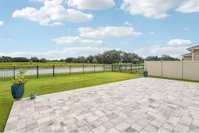 6076 Wandering Willow Drive, Wesley Chapel, FL 33545 - Photo 25