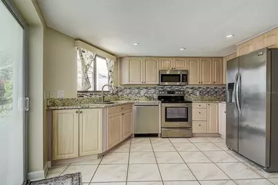 2876 Lake Valencia Boulevard E, Palm Harbor, FL 34684 - Photo 9