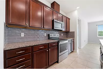 7912 Yale Harbor Drive, Wesley Chapel, FL 33545 - Photo 11