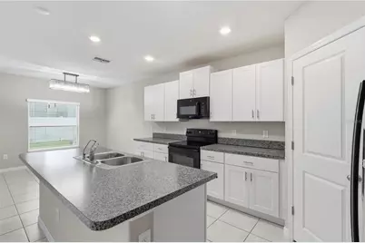 7023 Samuel Ivy Drive, Tampa, FL 33619 - Photo 9