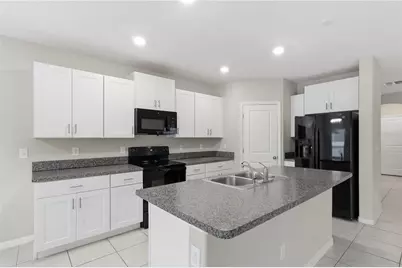7023 Samuel Ivy Drive, Tampa, FL 33619 - Photo 7