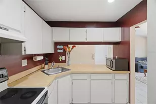 1182 Pine Ridge Cir W, Tarpon Springs, FL 34688 - Photo 5