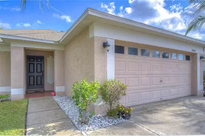30847 Bridgegate Drive, Wesley Chapel, FL 33545 - Photo 1