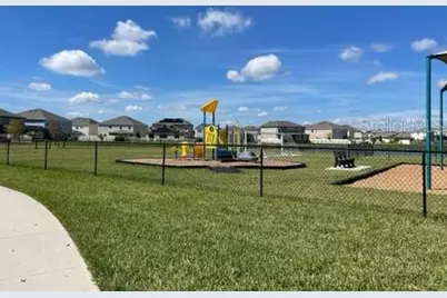 31893 Blue Passing Loop, Wesley Chapel, FL 33545 - Photo 25