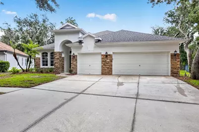 6135 Whimbrelwood Drive, Lithia, FL 33547 - Photo 1