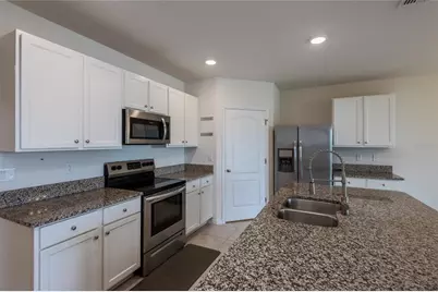 2433 White Poppy Drive, Kissimmee, FL 34747 - Photo 17