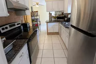 8002 Woodvine Pl, Tampa, FL 33615 - Photo 13