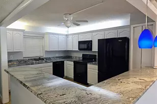 7600 Sun Island Dr S, South Pasadena, FL 33707 - Photo 9