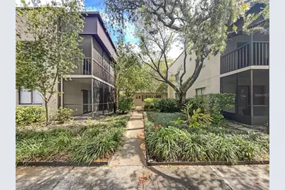 11703 Raintree Village Boulevard #C, Tampa, FL 33617 - Photo 1