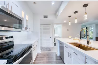 1328 Pelican Creek Crossing #D, Saint Petersburg, FL 33707 - Photo 25