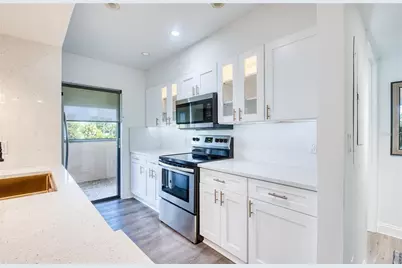1328 Pelican Creek Crossing #D, Saint Petersburg, FL 33707 - Photo 21