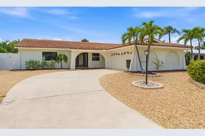 230 N Tessier Drive, Saint Pete Beach, FL 33706 - Photo 1
