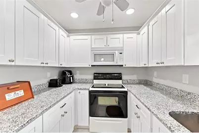 1906 Canterbury Lane #28, Sun City Center, FL 33573 - Photo 11