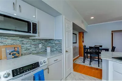 9034 Lake Chase Island Way #9034, Tampa, FL 33626 - Photo 21