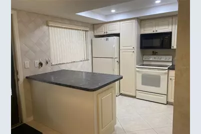 2440 Winding Creek Boulevard #108, Clearwater, FL 33761 - Photo 3