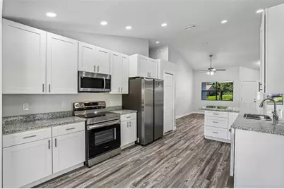 7019 Kensington High Boulevard, Orlando, FL 32818 - Photo 13