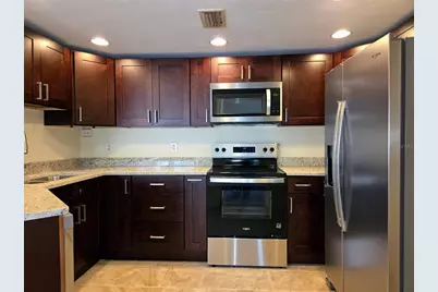 10365 Paradise Boulevard #13, Treasure Island, FL 33706 - Photo 9