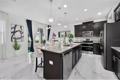 2527 Nouveau Way, Kissimmee, FL 34741 - Photo 11