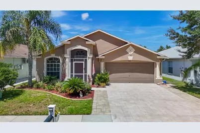 7441 Tower Bridge Drive, Wesley Chapel, FL 33545 - Photo 1