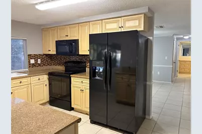 8701 Lincolnshire Drive, Hudson, FL 34667 - Photo 11