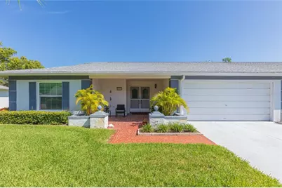 8423 Pebble Drive, Port Richey, FL 34668 - Photo 1