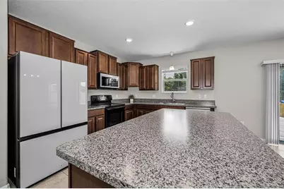 6780 Emerald Spring Loop, New Port Richey, FL 34653 - Photo 17