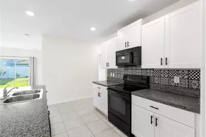 7310 Pearly Everlasting Avenue, Tampa, FL 33619 - Photo 11