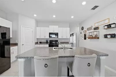 39745 Harvest Creek Lane, Zephyrhills, FL 33540 - Photo 13