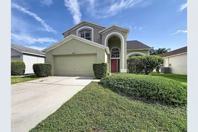 27402 Coral Springs Drive, Wesley Chapel, FL 33544 - Photo 1