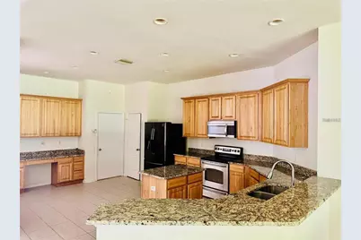 7346 Crescent Palm Drive, Wesley Chapel, FL 33545 - Photo 13