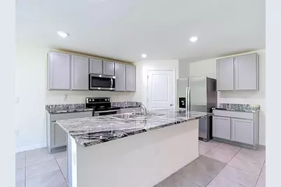 7737 Rosewood Garden Loop, Tampa, FL 33637 - Photo 27