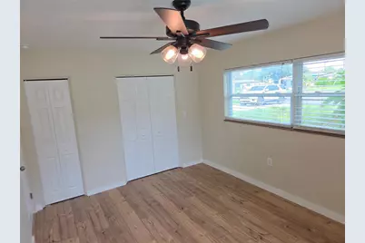 10827 Village Green Avenue, Seminole, FL 33772 - Photo 11