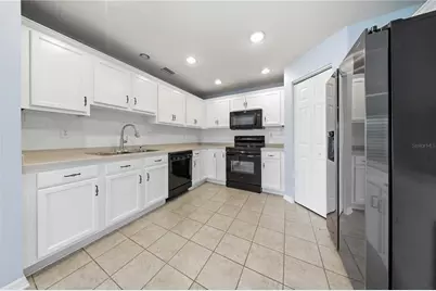 9515 Simeon Drive, Land O Lakes, FL 34638 - Photo 7