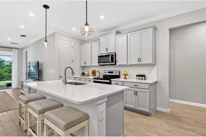 864 Snail Kite Place, Sun City Center, FL 33573 - Photo 13