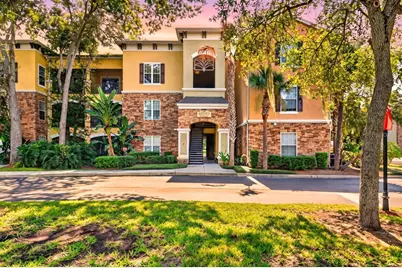 10103 Courtney Oaks Circle #302, Tampa, FL 33619 - Photo 1