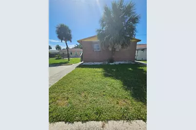 7840 Boca Ciega Drive, Saint Pete Beach, FL 33706 - Photo 1