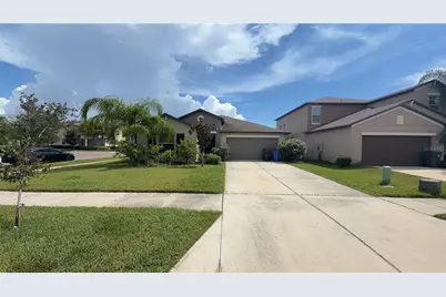 7419 Rosy Periwinkle Court, Tampa, FL 33619 - Photo 1