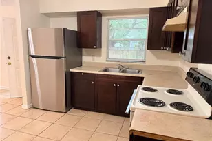 9406 N Hartts Dr, Tampa, FL 33617 - Photo 11