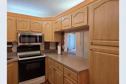 1700 Pine Ridge Way E #C1, Palm Harbor, FL 34684 - Photo 15