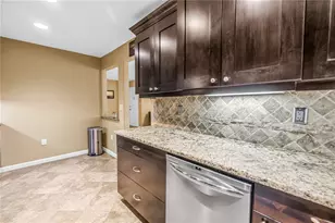 1290 Pine Ridge Cir E, Tarpon Springs, FL 34688 - Photo 27