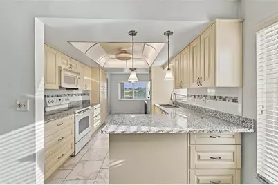 1405 Langley Drive, Sun City Center, FL 33573 - Photo 11
