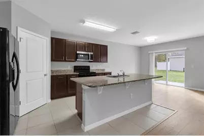 13740 Covey Run Place, Spring Hill, FL 34609 - Photo 5