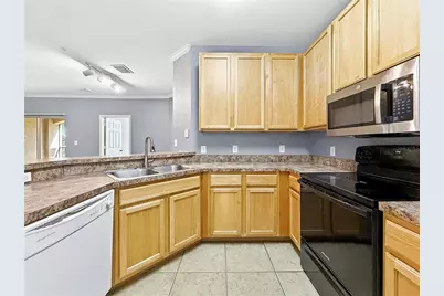 10209 Courtney Palms Boulevard #203, Tampa, FL 33619 - Photo 3