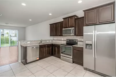 4714 White Sanderling Court, Tampa, FL 33619 - Photo 5