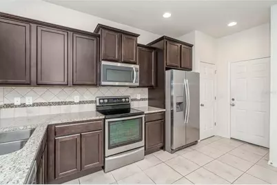 4714 White Sanderling Court, Tampa, FL 33619 - Photo 7