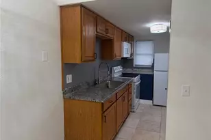 8709 N Mandarine Pl, Tampa, FL 33617 - Photo 9
